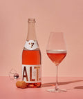 Różowe Wino Bezalkoholowe Sparkling Rosé z kieliszkiem